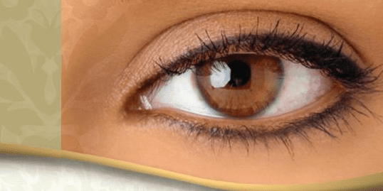 A close up of the eye of a woman